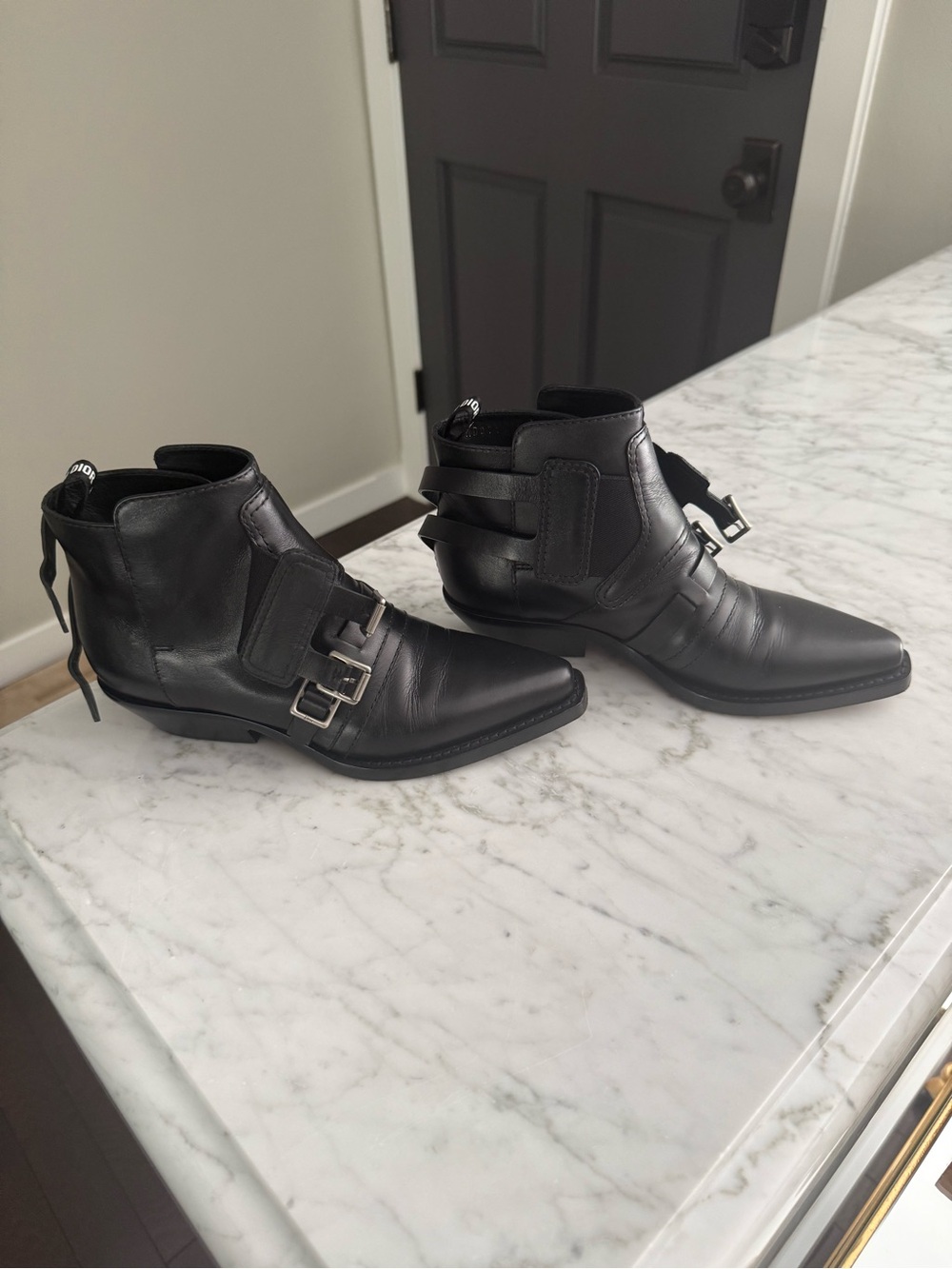 Christian Dior black leather booties 
Size 36 1/2 
Very good condition
